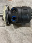 Oem White Motor-hydrualic RE18080200 S/n 28106411. Fixed Price $500.00.