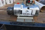 Bucher Hydraulics Altec 326 0230 8120 24 Volt Pump, Motor Bracket Free Ship. Fixed Price $899.00.
